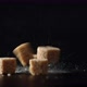 Brown Sugar Cubes Fall on the Table - VideoHive Item for Sale