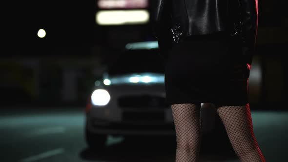Car Stopping Near Prostitute in Provocative Clothing on Dark Street, Night Life