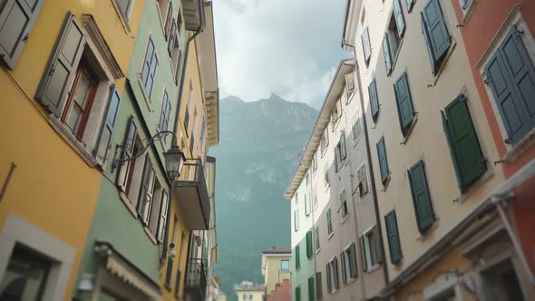 Old Vintage Buildings Against Giant Forestry Mountains