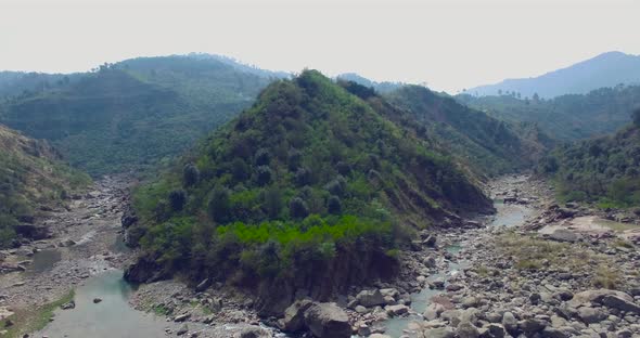 Shot a river between the mountains.