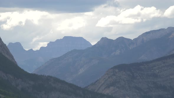 Pan right of mountain peaks and hills