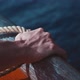 Fisherman's hand on a boat in the Caribbean ocean - VideoHive Item for Sale