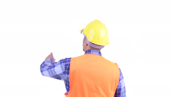 Rear View of Bearded Persian Man Construction Worker Directing and Pointing Finger