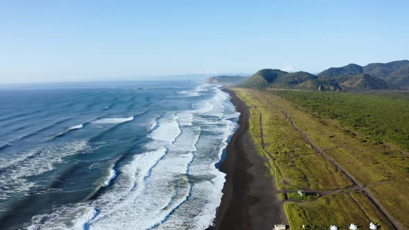 Sunny Khalaktyrsky Beach with Black Sand on Kamchatka 