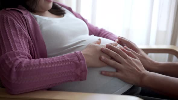 Pregnant Couple Feels Love and Relax at Home