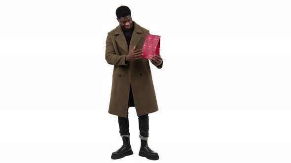 African American Man Bringing a Present White Background  Full Shot Isolated