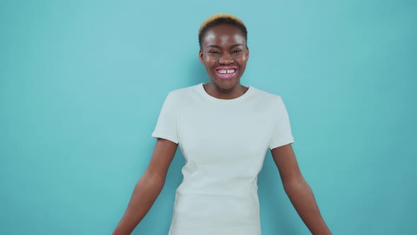 Portrait of Afro Girl Showing Surprised Emotions on Camera