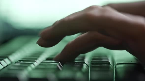 Hands of Woman Hacker Typing on Keyboard