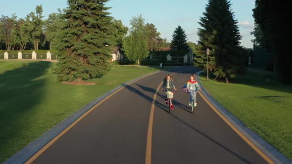 Aerial View of Two Lesbians Riding Bikes in Park