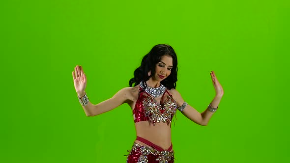 Dancing Belly Dance with Red Dress. Green Screen. Slow Motion