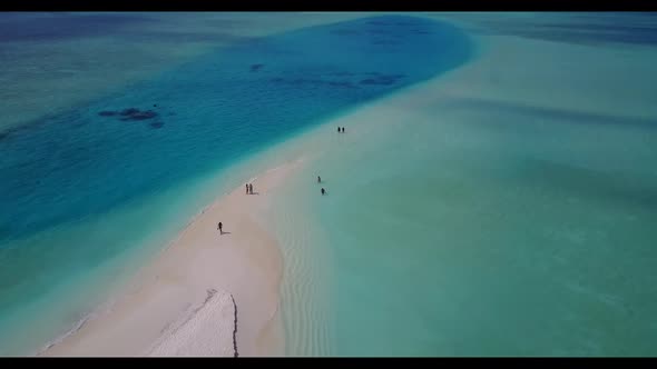 Aerial drone tourism of beautiful sea view beach voyage by blue lagoon with white sand background of