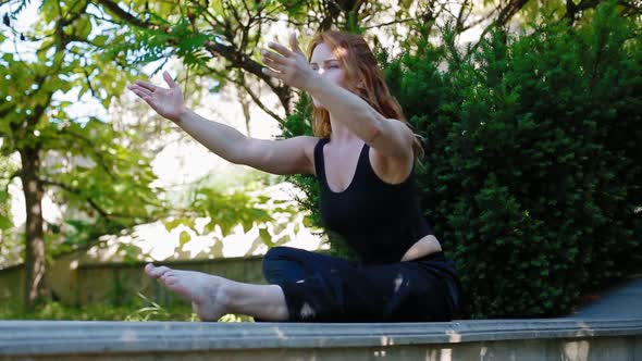 Woman Doing Bearhing Exercise Outdoors