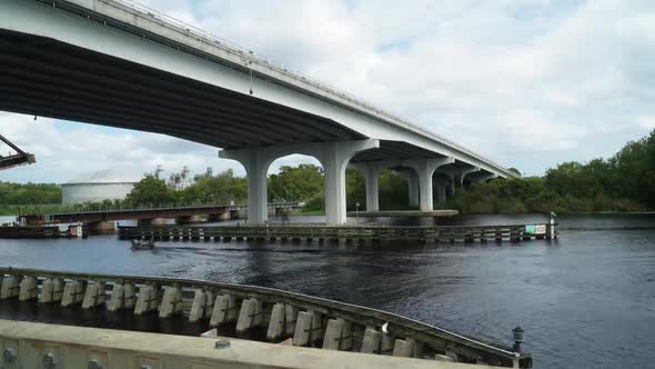 Time lapse of Boats passing under a bridge at Lake Monroe Wayside Park Sanford, Florida Seminole Cou