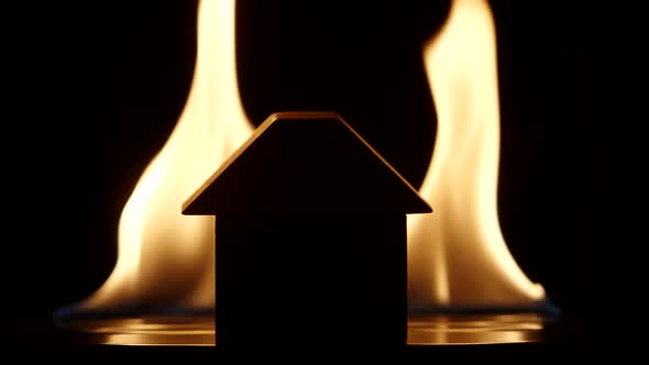 Silhouette Of A House On A Flaming Background - Slow motion
