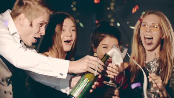 Asian Girl and Group Young College Student Friends Celebrating at Glamorous Rooftop Party Ant Making