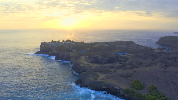 Sunset To Broken Beach in Nusa Penida, Bali, Indonesia. Aerial View 