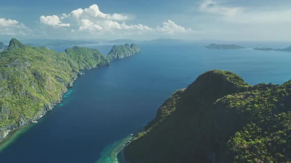 Aerial View of Mountain Greenery Island at Ocean Bay on Summer Sunny Day