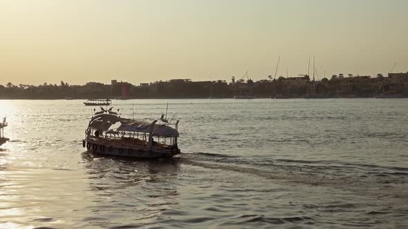 Nile River with Boat in Luxor at Sunset Egypt