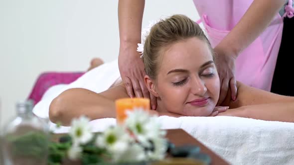Woman Gets Back Massage Spa By Massage Therapist