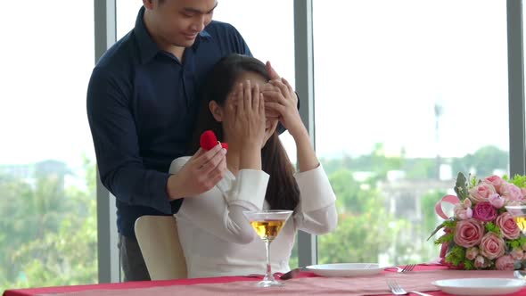 Happy Romantic Couple Eating Lunch at Restaurant