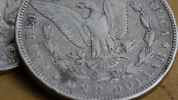 Rotating stock footage shot of antique American coins - MONEY 0088