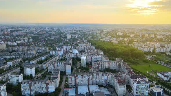 Aerial View of High Rise Apartment Buildings Private Houses and Streets in City Residential Area in