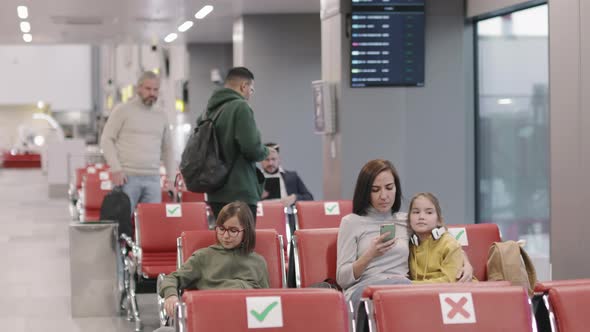 Passengers Waiting In Departure Lounge