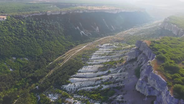 Aerial View Vertically Down on the Valley with Green Trees in White Canyon