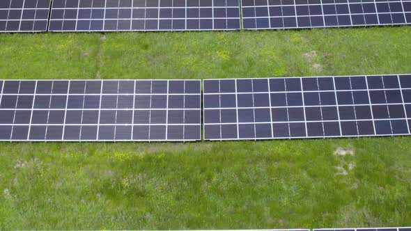 Photovoltaic Panels In The Solar Farm, Eco-friendly Source Of Electricity. - aerial