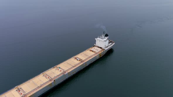 High quality, 4K aerial view of a cargo ship navigating the St Lawrence Seaway, Canada.