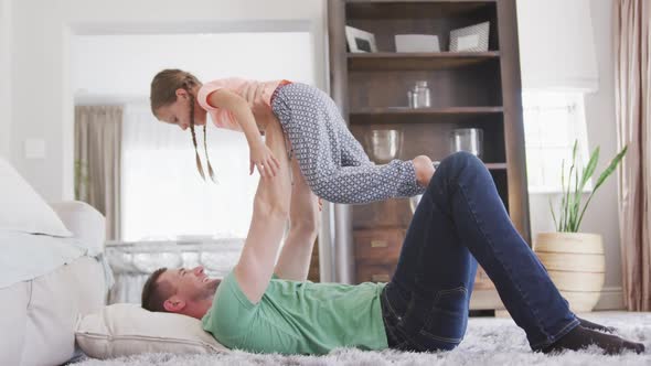 Father having fun with his daughter