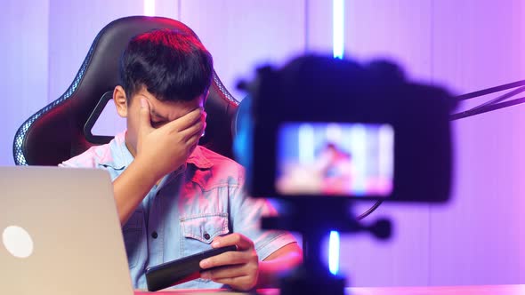 Asian Kid Boy Playing Video Game With Mobile Phone Then Lose The Game While Live Stream