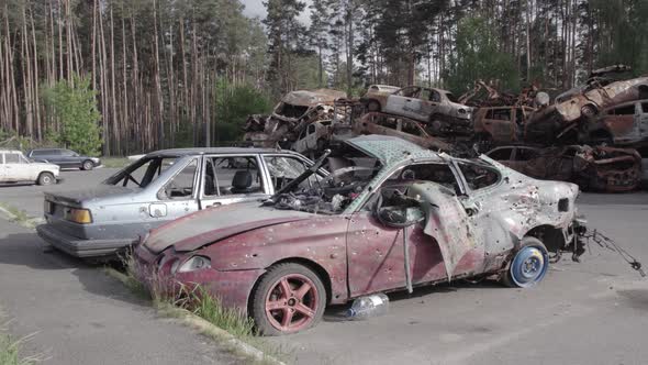 War in Ukraine a Dump of Burned Cars in Irpin Bucha District