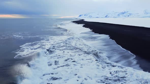 Black Beach with Volcanic Sand in Iceland in Frosty Winter Day Famous Landmark Beautiful Aerial