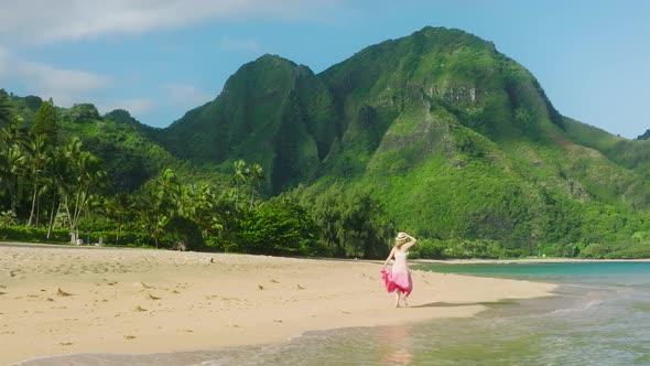 Slow Motion Happy Woman Running in Romantic Beach Dress Flattering Ocean Breeze