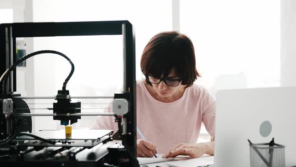 Adult Woman with 3D Printer