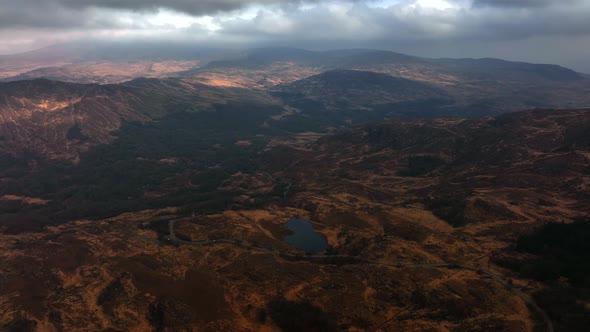 Killarney, Kerry, Ireland, March 2022. Drone tracks south while facing east towards Esknamucky Glen