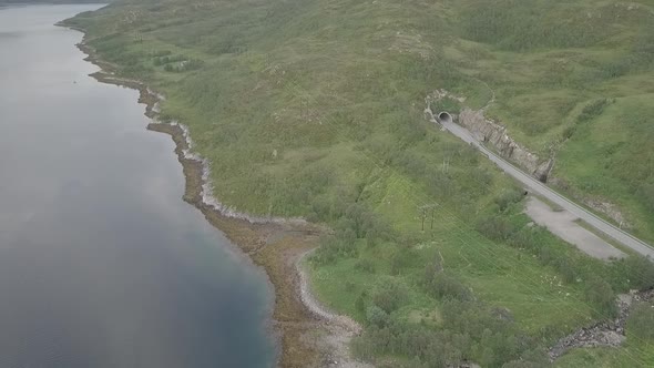 Midnight Sun in Napp/Flakdstad, Lofoten Islands, Norway Aerial Drone 4K