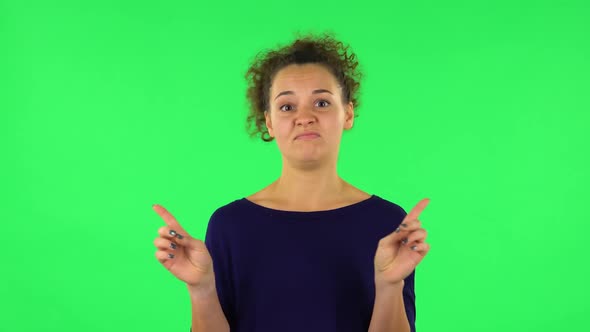 Portrait of Upset Woman Negatively Waving Her Head Expressing She Is Innocent. Green Screen