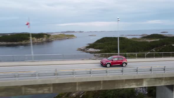 Hyundai Kona Electric driving over bridge