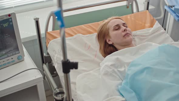 Unconscious Patient in Intensive Care Room