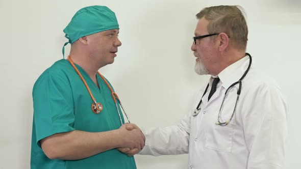Friendly Conversation Between Two Doctors