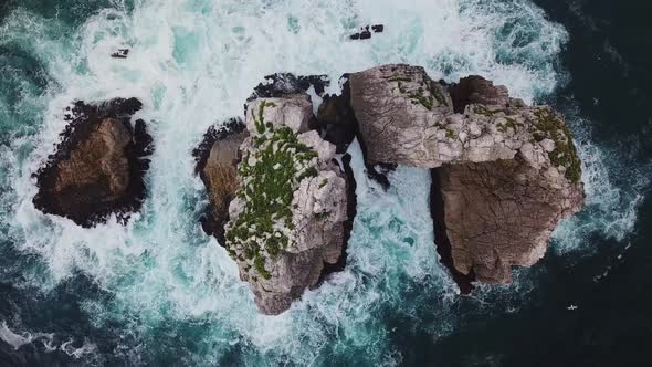 Aerial View of Reefs and Cliffs After Dawn on Arnia Beach. Northern Spain in Summer