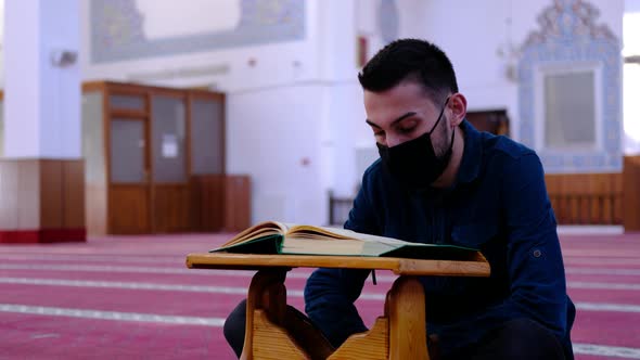 Man Masked Who Recite the Quran Mosque