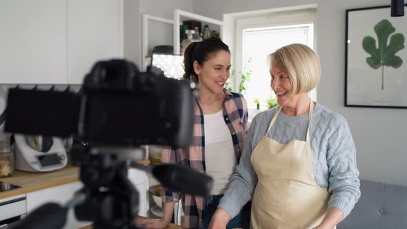 Tracking video of senior woman during filming a video blog.  Shot with RED helium camera in 8K.