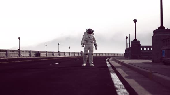 Astronaut Walks in the Middle of a Road alt
