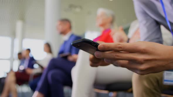 Businessman using mobile phone in the business seminar 4k