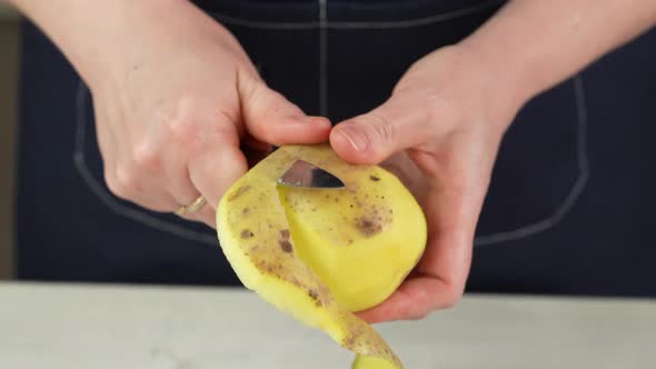 Cleaning Potatoes with Knives