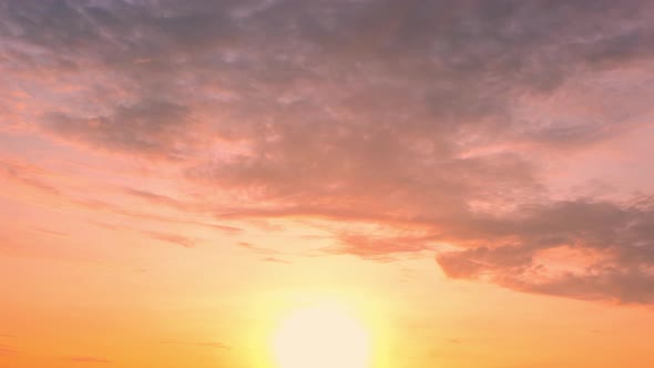 4K UHD : Time lapse of colorful sky during beautiful sunset. Romantic clouds. Summer sky alt