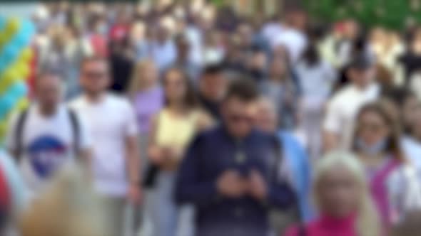 Silhouettes of People Walking in a Crowd Slow Motion